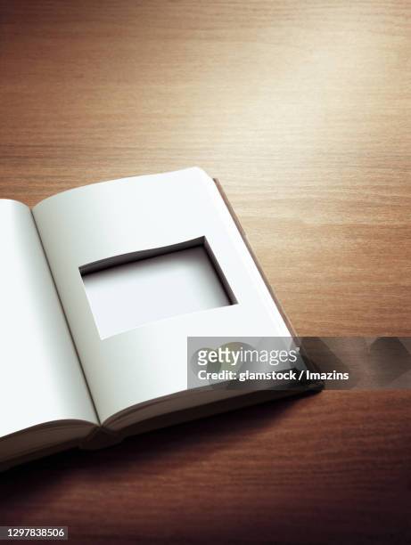 secret, book, hole, wood table, table - hollow stock pictures, royalty-free photos & images