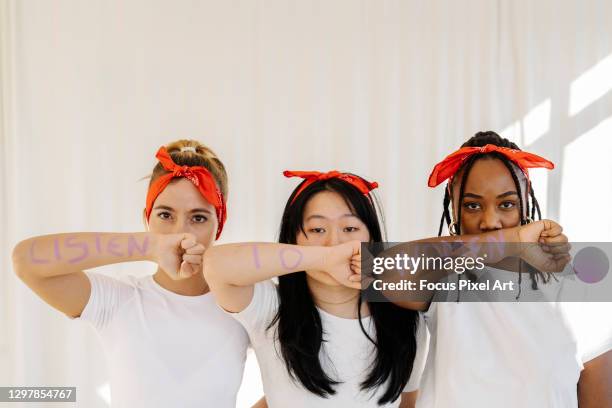 group of women fighting for women's rights.feminism and gender equality concept. - droits de la femme photos et images de collection