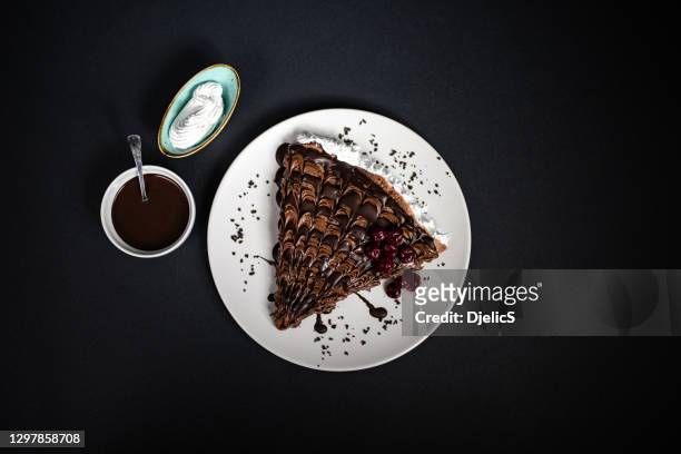 beautiful crepe with chocolate spread,whipped cream and cherries. - nutella pancake stock pictures, royalty-free photos & images
