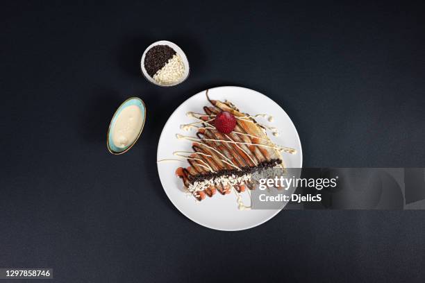 beautiful crepe with chocolate spread and strawberries. - strawberry banana stock pictures, royalty-free photos & images