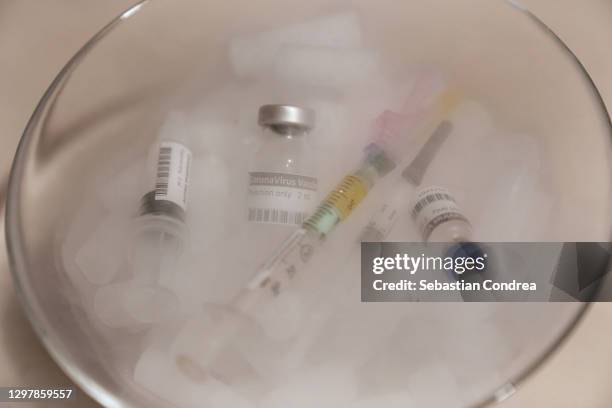 vaccine storage fridge, covid-19 vaccine stored at low temperature. labeled sars-cov-2 against coronavirus - dry ice storage stock pictures, royalty-free photos & images