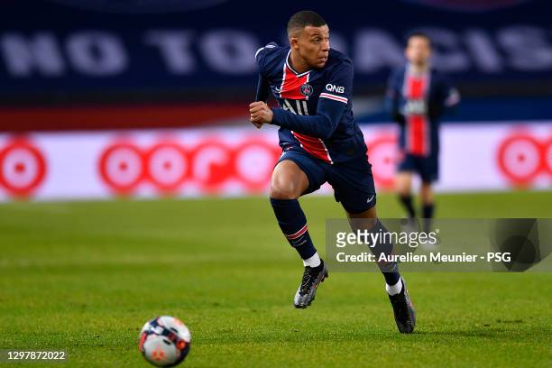 Kylian Mbappe of Paris Saint-Germain runs with the ball during the Ligue 1 match between Paris Saint-Germain and Montpellier HSC at Parc des Princes...