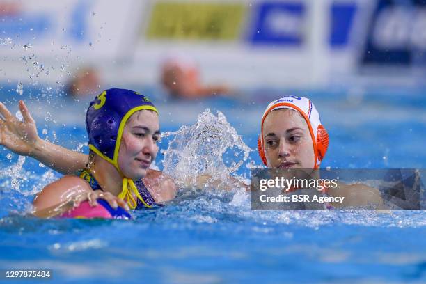 Aizhan Akilbayeva of Kazakhstan, Dagmar Genee of Netherlands during the match between Netherlands and Kazachstan at Women's Water Polo Olympic Games...