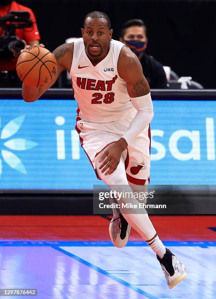Andre Iguodala of the Miami Heat brings the ball up during a game against the Toronto Raptors at Amalie Arena on January 22, 2021 in Tampa, Florida....