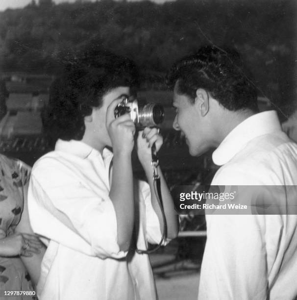 Teen idols Annette Funicello and Frankie Avalon talk backstage during rehearsal for "Dick Clark's Caravan of Stars" at the Hollywood Bowl, August 30,...