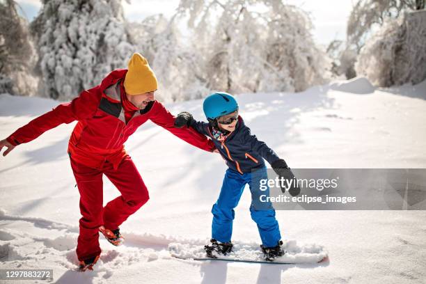 ja, dat kan - snowboarding stockfoto's en -beelden