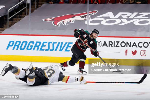 Derick Brassard of the Arizona Coyotes shoots to score a goal past William Carrier of the Vegas Golden Knights during the second period of the NHL...