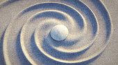 Japanese ZEN garden with sand waves spiral and single stone