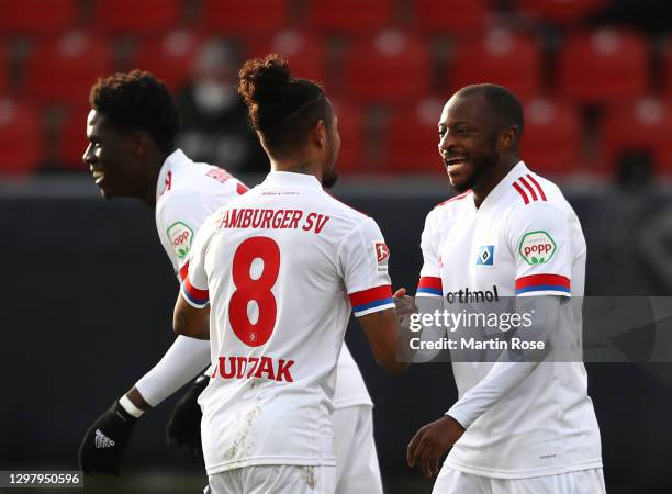 David Kinsombi of Hamburger SV celebrates with teammate Jeremy Dudziak after scoring his team's fourth goal during the Second Bundesliga match...