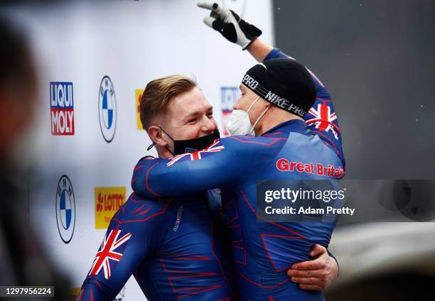 Brad Hall and Greg Cackett of Great Britain celebrate a strong finish during the BMW IBSF 2-Man bobsleigh World Cup Koenigssee at LOTTO Bayern...