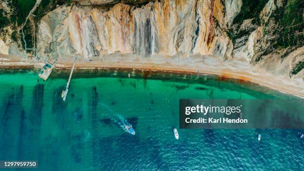 an aerial view of alum bay on the isle of wight, uk - stock photo - isle of wight - fotografias e filmes do acervo