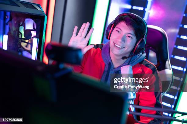 young asian cyber sport gamer - live stream stock pictures, royalty-free photos & images