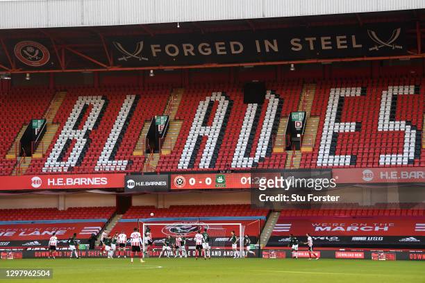 General view as players of Sheffield United take a corner-kick in front of empty stands during The Emirates FA Cup Fourth Round match between...