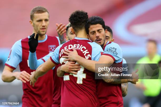 Pablo Fornals of West Ham United celebrates with teammate Ryan Fredericks after scoring their team's first goal during The Emirates FA Cup Fourth...