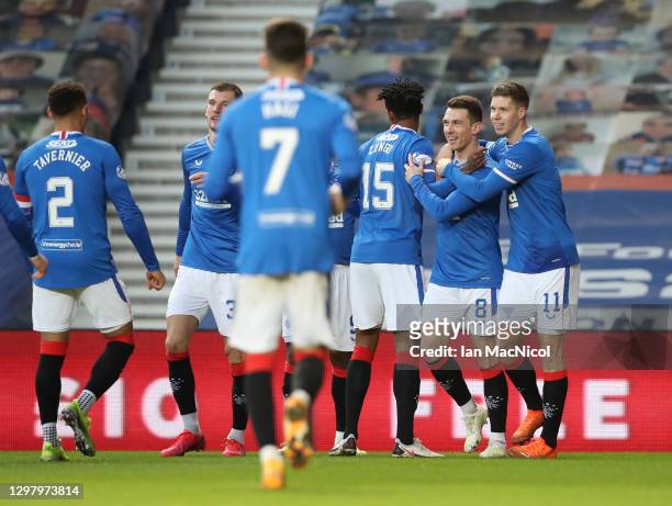Ryan Jack of Rangers celebrates with teammates Bongani Zungu and Cedric Itten after scoring his team's fourth goal during the Ladbrokes Scottish...