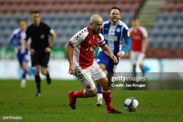 Paddy Madden of Fleetwood Town controls the ball during the Sky Bet League One match between Wigan Athletic and Fleetwood Town at DW Stadium on...