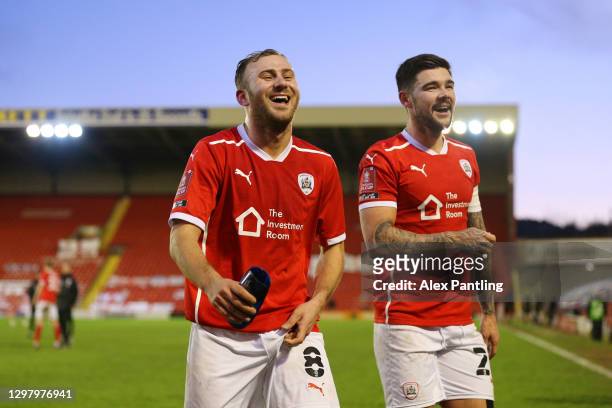 Herbie Kane of Barnsley and Alex Mowatt of Barnsley celebrate following their team's victory in The Emirates FA Cup Fourth Round match between...