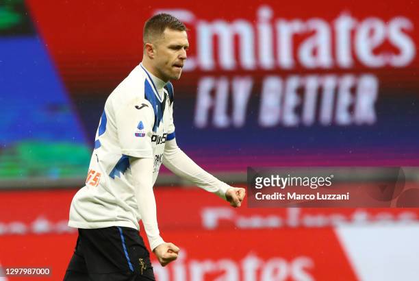 Josip Ilicic of Atalanta B.C. Celebrates after scoring their team's second goal from the penalty spot during the Serie A match between AC Milan and...