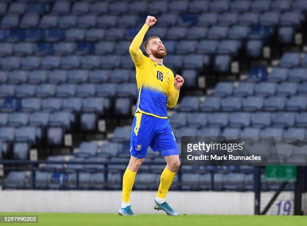 Shaun Rooney of St Johnstone celebrates after scoring their side's second goal during the Betfred Cup Semi-Final match between St Johnstone and...