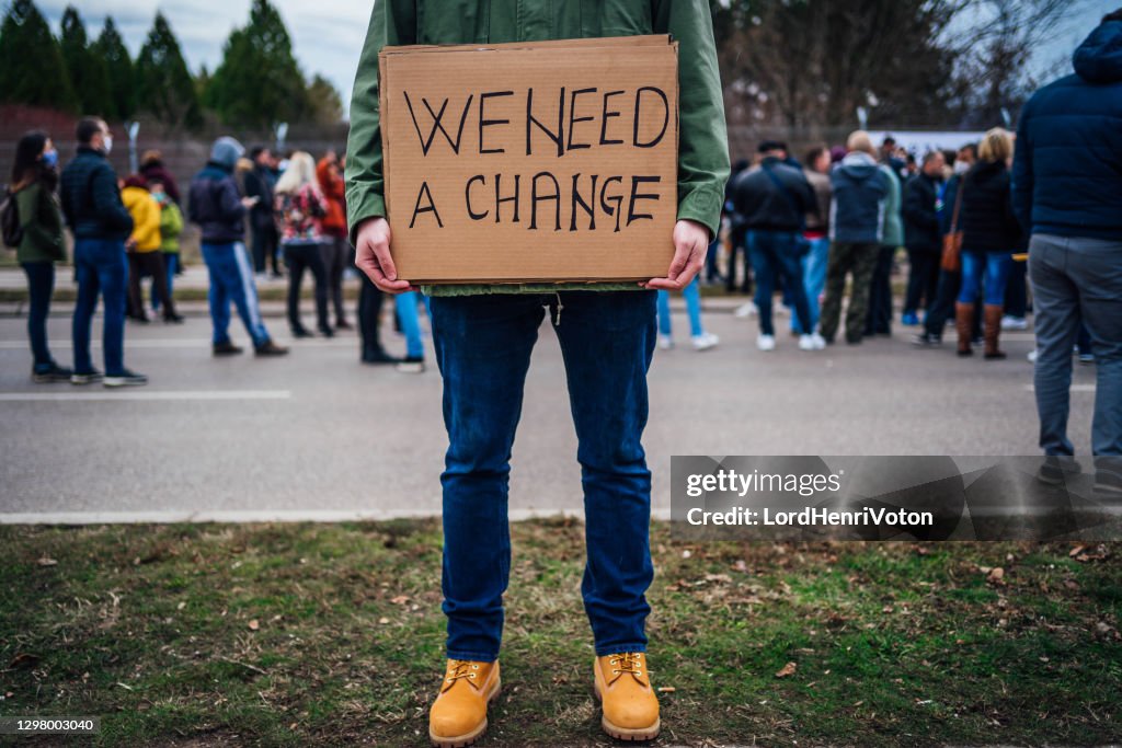 Man protesting at the street