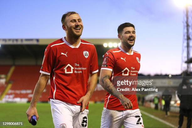 Herbie Kane and Alex Mowatt of Barnsley during The Emirates FA Cup Fourth Round match between Barnsley and Norwich City at Oakwell Stadium on January...