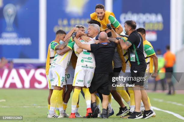 Braian Romero of Defensa y Justicia celebrates with teammates after scoring the second goal of his team during the final of Copa CONMEBOL...