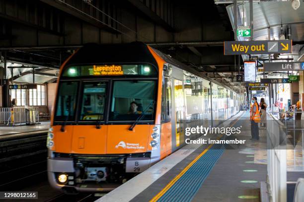 train arriving at subway train station, background with copy space - sydney metro stock pictures, royalty-free photos & images