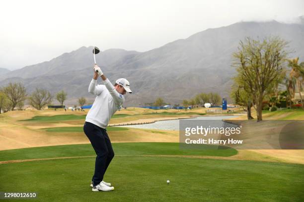 Nick Taylor of Canada plays his shot from the ninth tee during the third round of The American Express tournament on the Stadium course at PGA West...