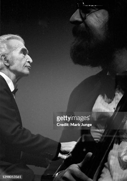 Dave Brubeck plays the piano while his son, Chris, plays the electric bass during the Dave Brubeck Jazz Quartet concert at the Cheyenne Civic Center...