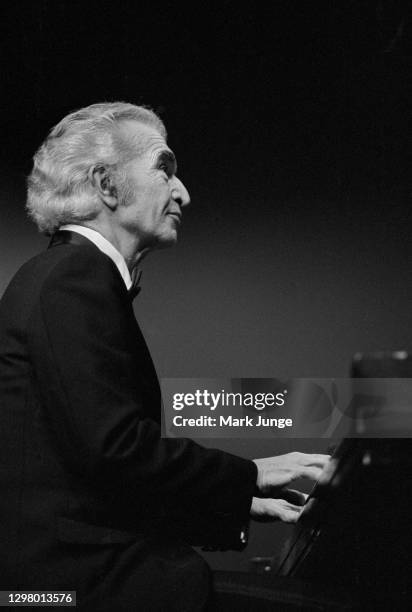 Dave Brubeck plays the piano during his jazz quartet concert at the Cheyenne Civic Center on November 1, 1986 in Cheyenne, Wyoming.