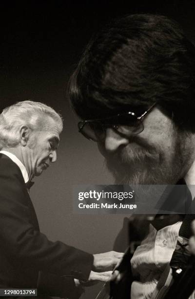 Dave Brubeck plays the piano while his son, Chris, plays the electric bass during the Brubeck Jazz Quartet concert at the Cheyenne Civic Center on...