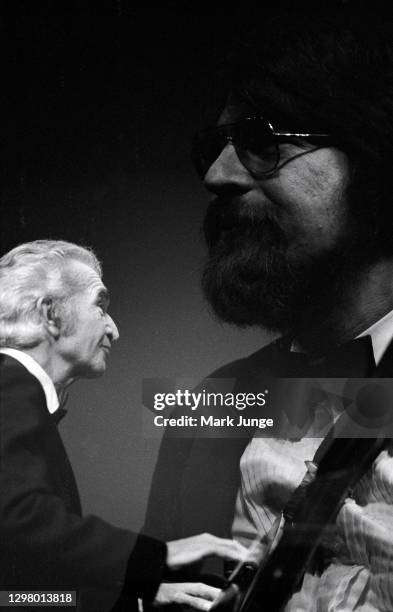 Dave Brubeck plays the piano while Chris Brubeck plays the electric bass during the Dave Brubeck Jazz Quartet concert at the Cheyenne Civic Center on...