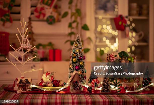 christmas trees on dining room table - christmas tartan stock pictures, royalty-free photos & images
