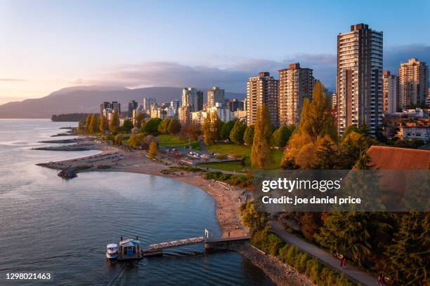 sunset, aquatic centre ferry dock, vancouver, skyline, british columbia, canada - vancouver sunset stock pictures, royalty-free photos & images