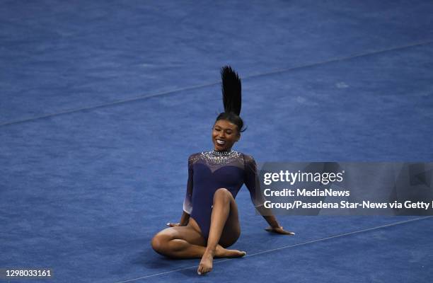 Los Angeles, CA UCLA Bruins gymnast Nia Dennis competes in the floor exercise against the Arizona State Wildcats during the season opener in Pauley...