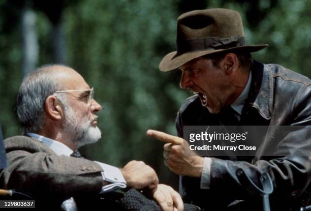 American actor Harrison Ford as the eponymous archaeologist and Scottish actor Sean Connery as his father Henry Jones during the motorcycle chase...