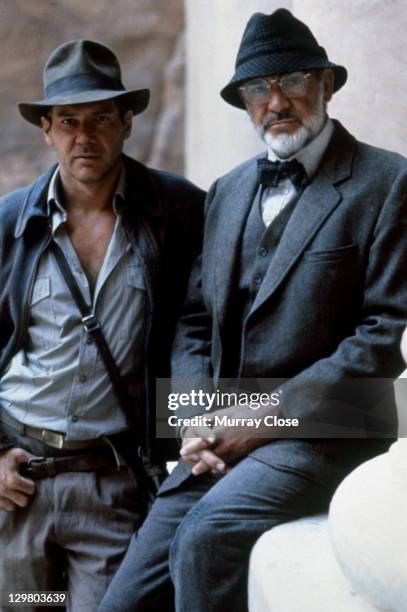 American actor Harrison Ford as the eponymous archaeologist and Scottish actor Sean Connery as his father Henry Jones in a publicity still for the...