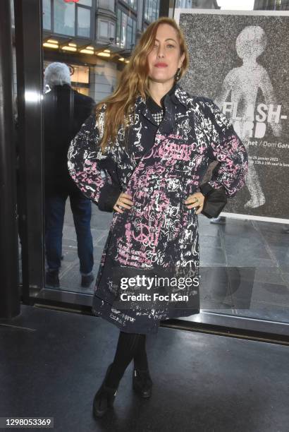 Actress Myriam Charleins is dressed by Photographer/fashion designer Karim Bonnet from Impasse De La Defense during "Flash-Forward" Photo Exhibition...