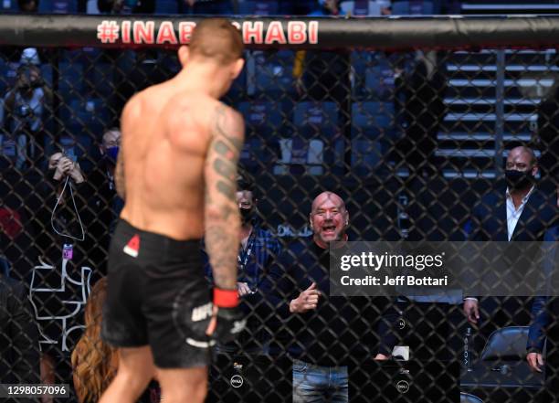 President Dana White reacts after Dustin Poirier's knockout over Conor McGregor of Ireland in a lightweight fight during the UFC 257 event inside...