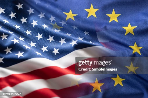 American and European Union flags together. Cooperation between the United States of America and the European Union. American and European Union flags together. Cooperation between the United States of America and the European Union.