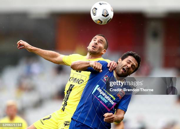 Nikolai Topor-Stanley of the Jets competes with Tomer Hemed of the Phoenix during the A-League match between the the Wellington Phoenix and the...