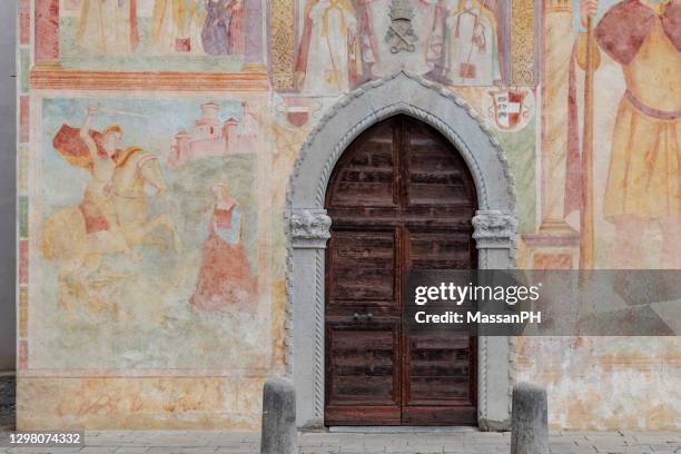 portal and fresco of saints' peter and blaise church in borgo brossana, cividale del friuli - roman fresco stock pictures, royalty-free photos & images