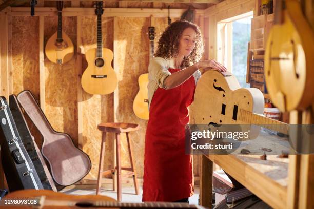 guitar luthier workshop - instrument maker stock pictures, royalty-free photos & images