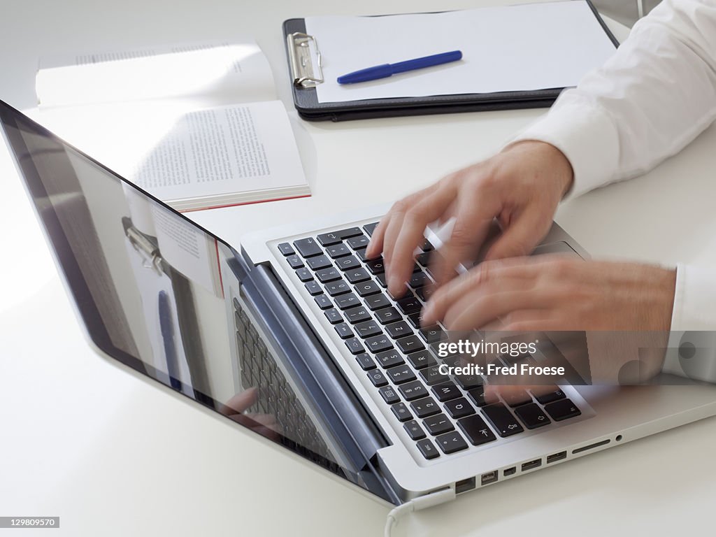 Blogger using laptop