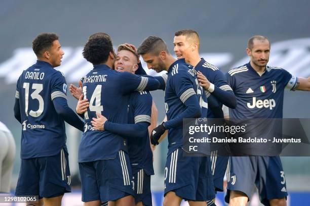 Arthur Melo of Juventus celebrates with teammates after scoring his team's first goal the Serie A match between Juventus and Bologna FC at Allianz...