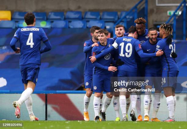 Tammy Abraham of Chelsea celebrates after scoring their sides first goal with team mates Christian Pulisic, Billy Gilmour, Timo Werner, Mason Mount,...