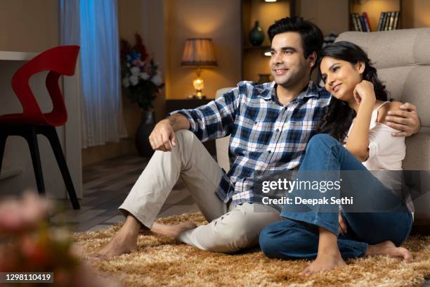 young couple, stock photo - indian living room stock pictures, royalty-free photos & images