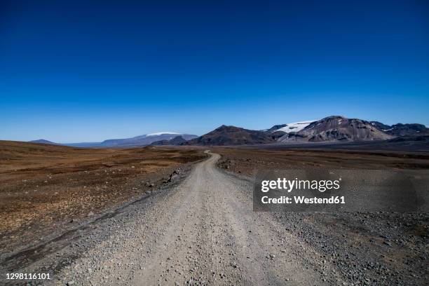 kaldidalur dirt road 550 against mountain and clear sky - kaldidalur stock pictures, royalty-free photos & images