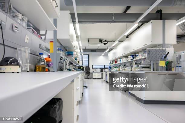 interior of science lab with medical equipment - cleanroom stock-fotos und bilder