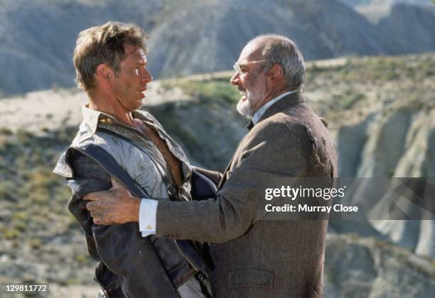 American actor Harrison Ford as the eponymous archaeologist and Scottish actor Sean Connery as his father Henry Jones in a scene from the film...